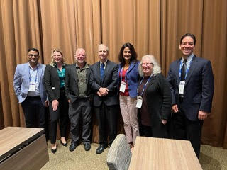 Dr. Ahuja at a conference panel